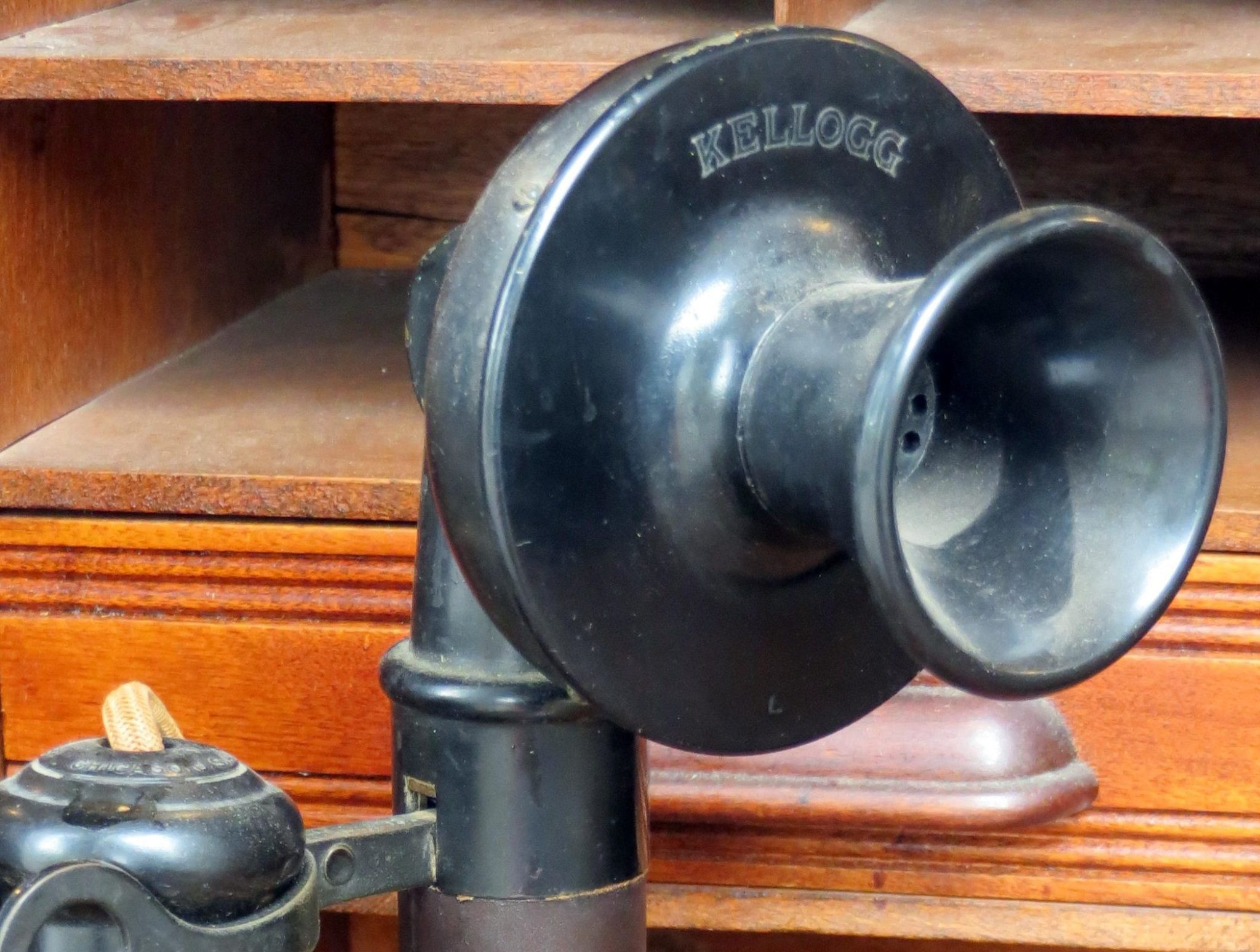 An antique phone representing a link to the Charts Music Studio 'Contact Us' page